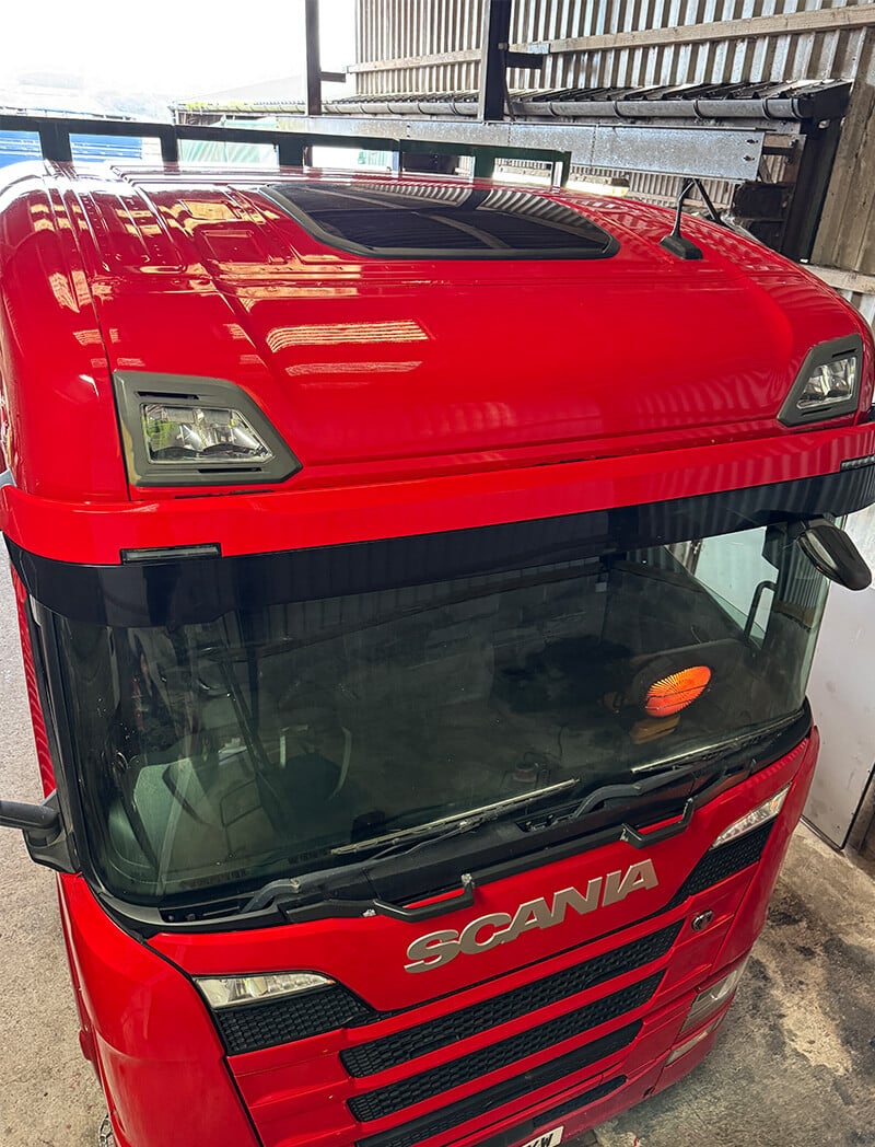 Truck wrap detailing front grille area and brand alignment