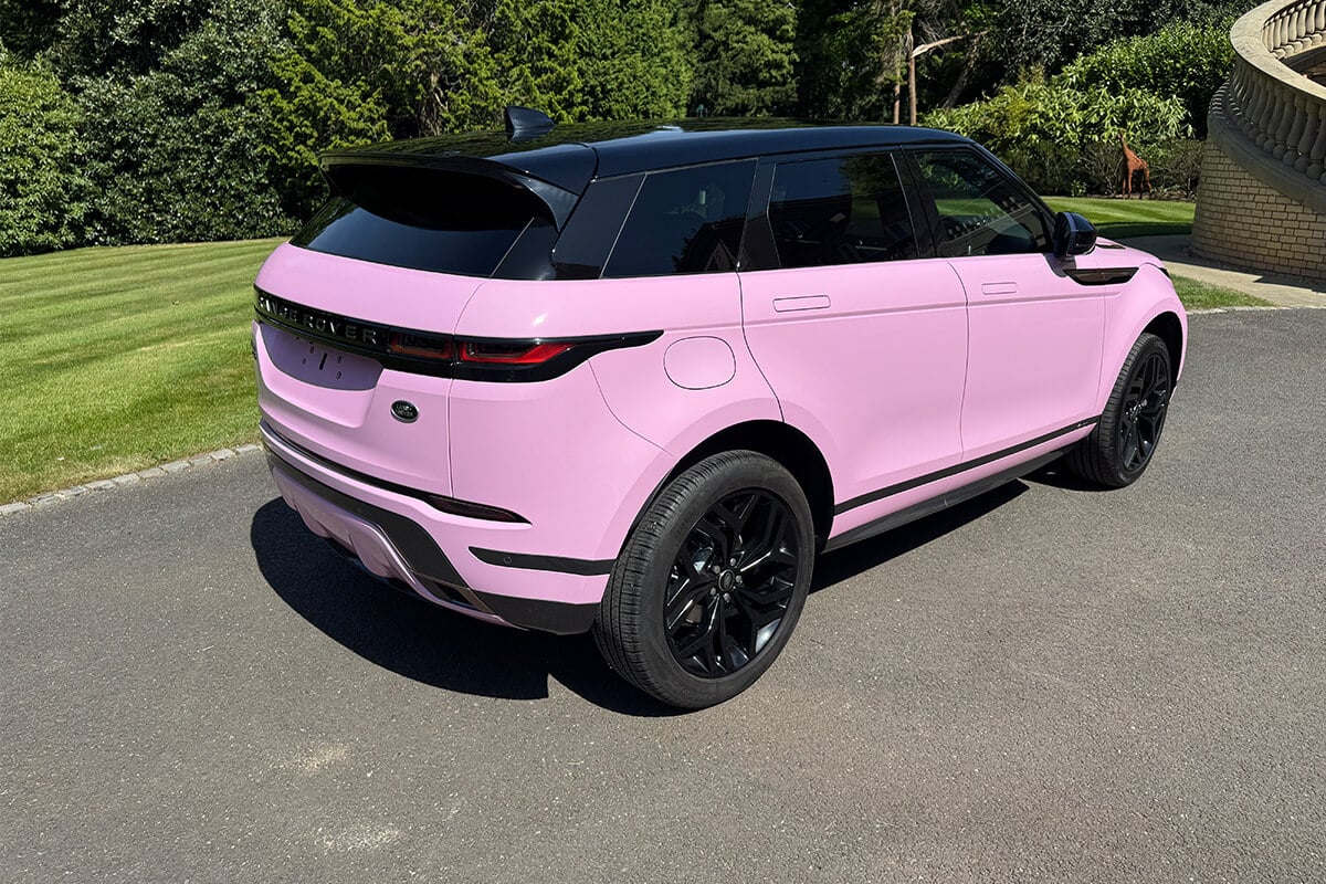 Range Rover Evoque in gloss pink full-body wrap – premium automotive branding