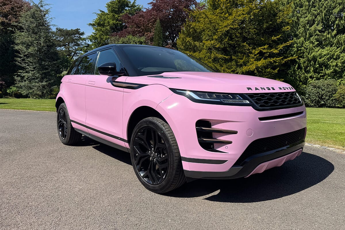 Luxury Range Rover Evoque wrapped in gloss pink finish
