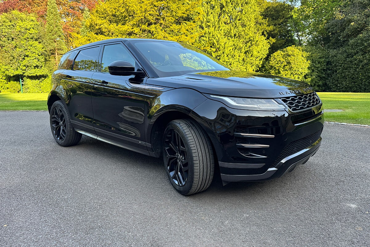 Matte black luxury SUV full wrap by Korok Group vehicle wrapping team